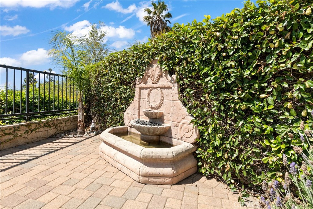 13939 Guidera Drive Rancho Cucamonga, CA 91739 - Photo 46 of 46 a view of a porch with plants and garden