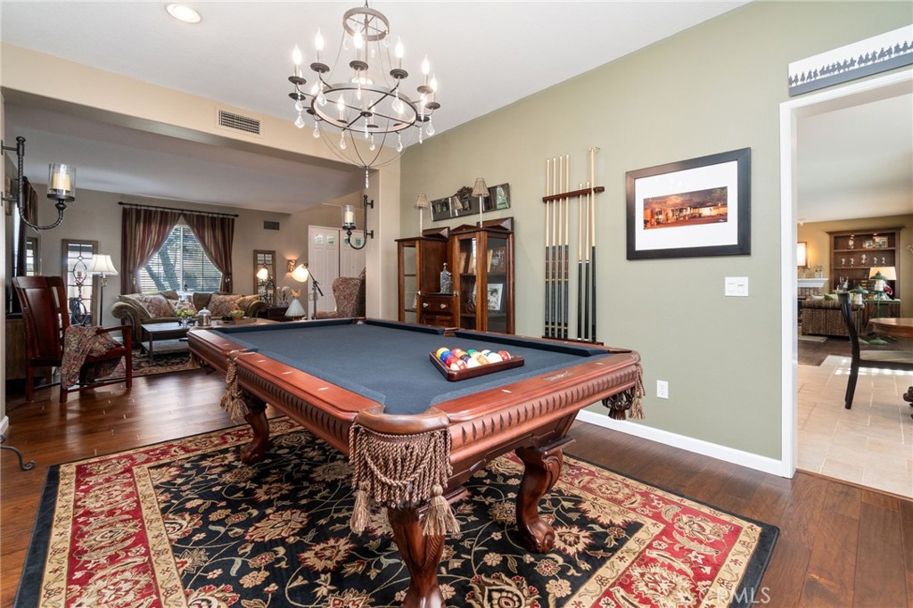 13939 Guidera Drive Rancho Cucamonga, CA 91739 - Photo 8 of 46 a room with pool table and wooden floor