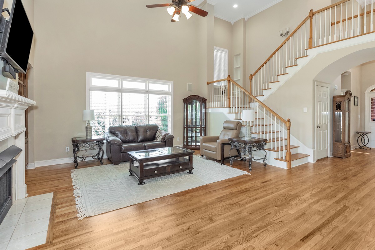 11035 Mathis Mountain Road Southeast Huntsville, AL 35803 - Photo 22 of 40 a living room with furniture and a fireplace