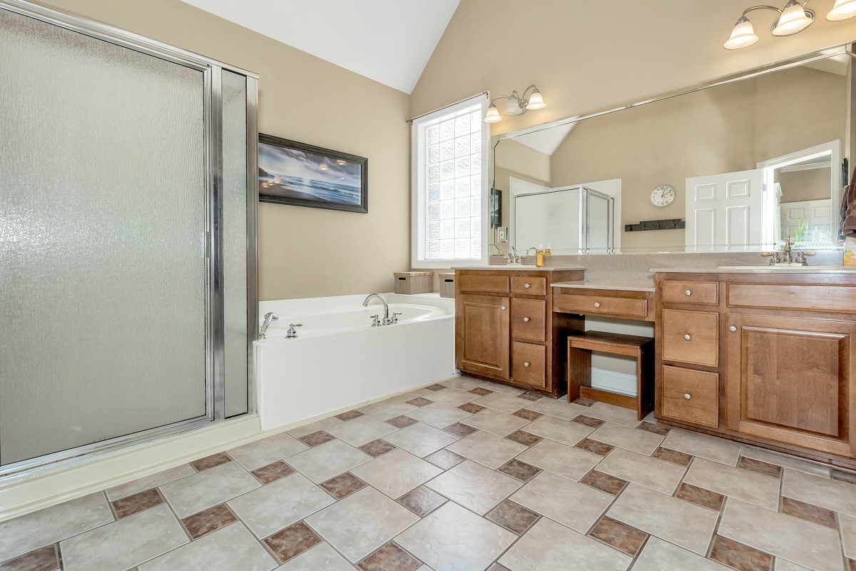 11035 Mathis Mountain Road Southeast Huntsville, AL 35803 - Photo 25 of 40 a kitchen with a cabinets and appliances