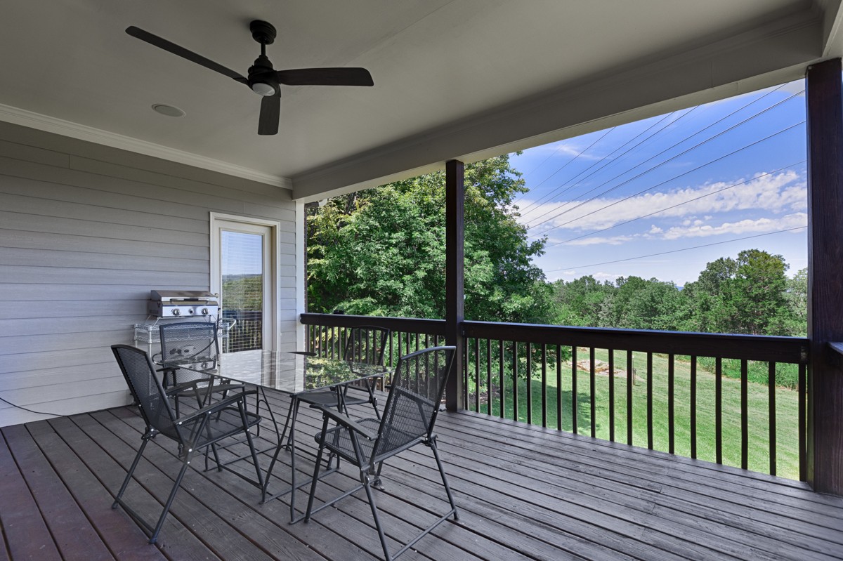 11035 Mathis Mountain Road Southeast Huntsville, AL 35803 - Photo 4 of 40 a view of a balcony with furniture
