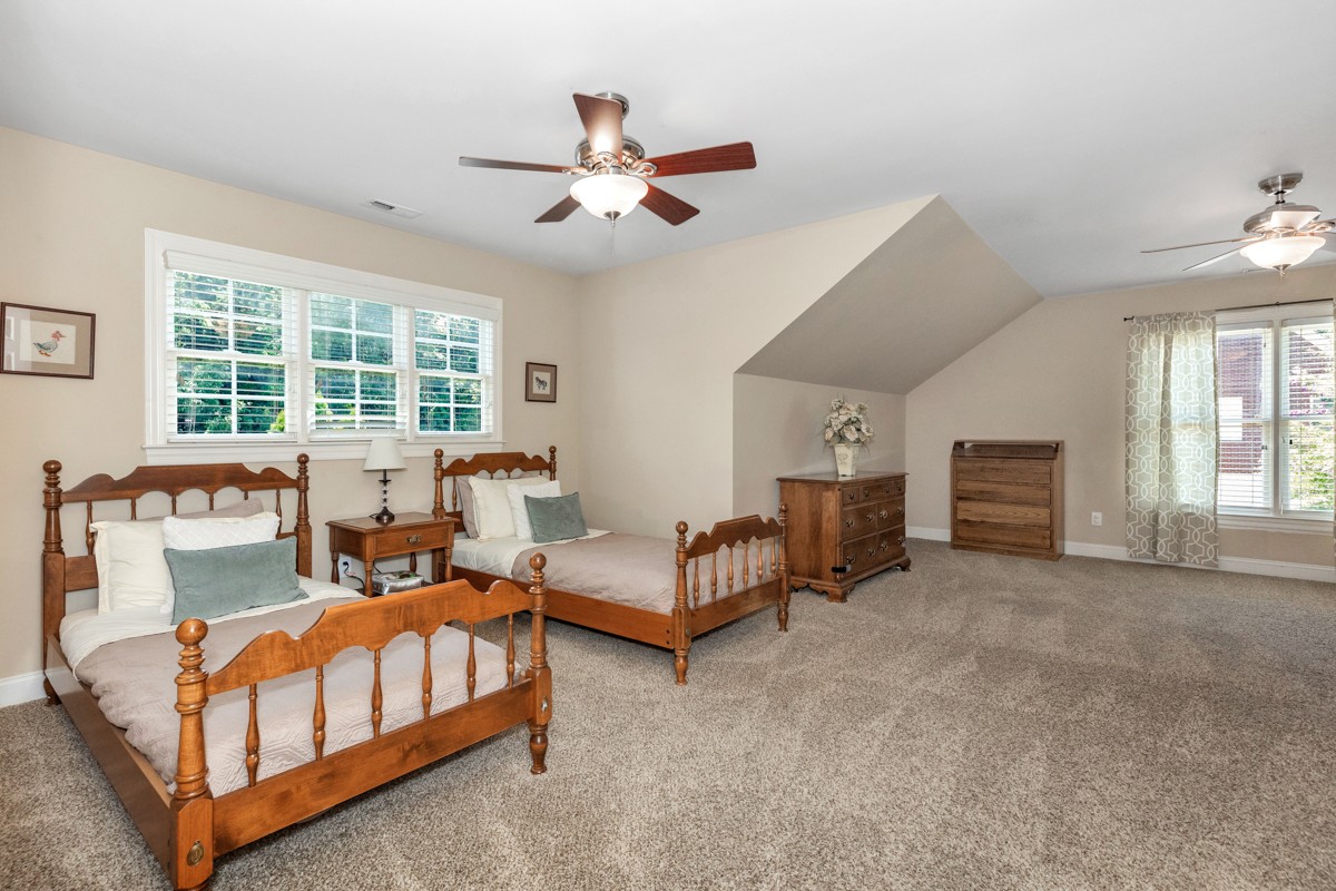 11035 Mathis Mountain Road Southeast Huntsville, AL 35803 - Photo 9 of 40 a living room with furniture and a large window