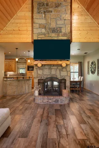 a spacious bedroom with a bed and a couch