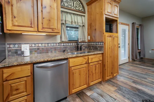 a view of a kitchen from the hallway