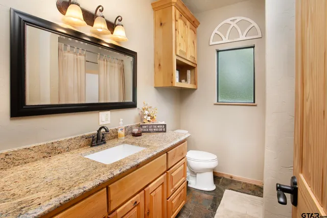 a bedroom with a workspace