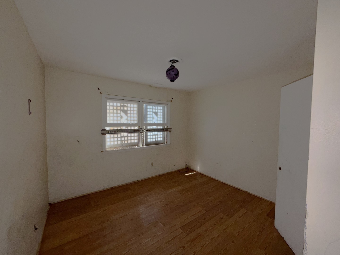 962 Oliver Avenue Aurora, IL 60506 - Photo 14 of 17 an empty room with a window
