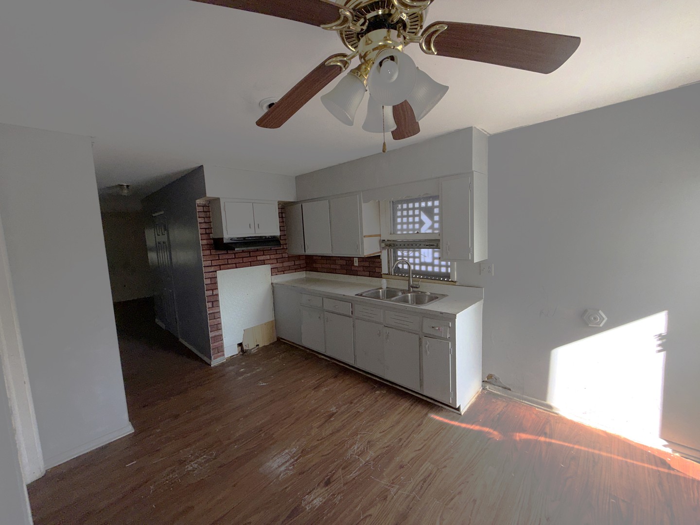 962 Oliver Avenue Aurora, IL 60506 - Photo 17 of 17 a kitchen with stainless steel appliances a sink and a refrigerator