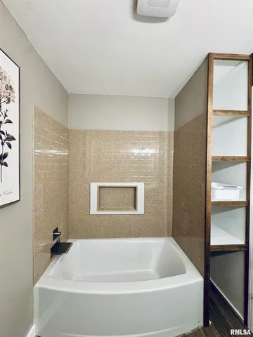 a bathroom with a bathtub