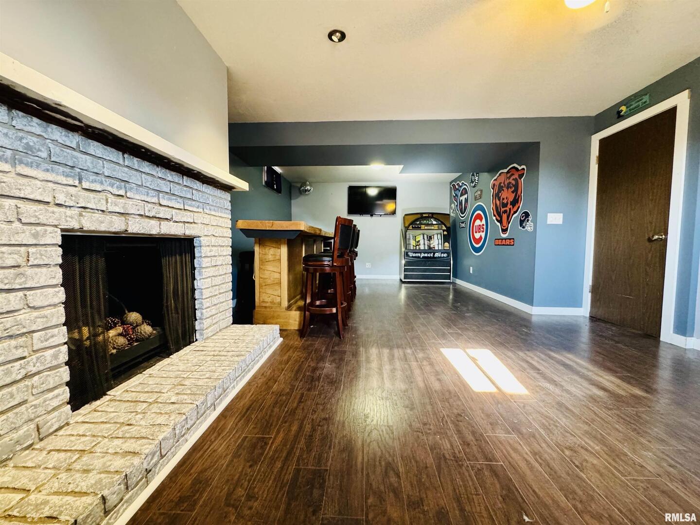 708 Tower Road Clinton, IA 52732 - Photo 24 of 34 a view of a livingroom with furniture and a fireplace