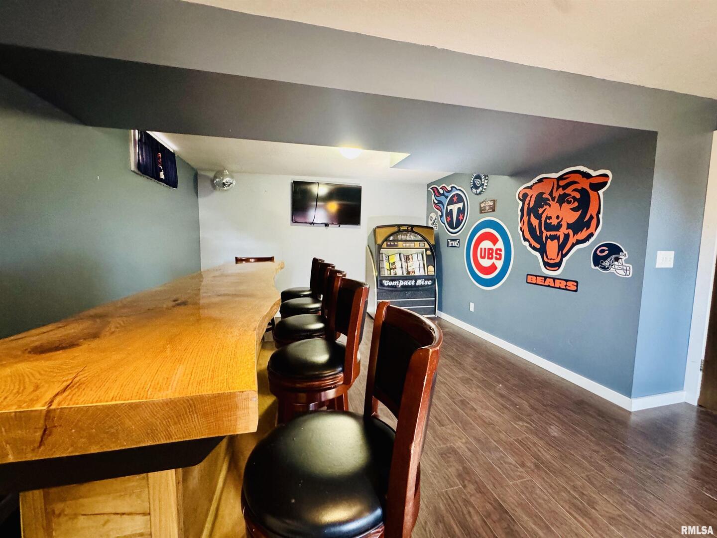 708 Tower Road Clinton, IA 52732 - Photo 26 of 34 a view of a room with furniture and wooden floor
