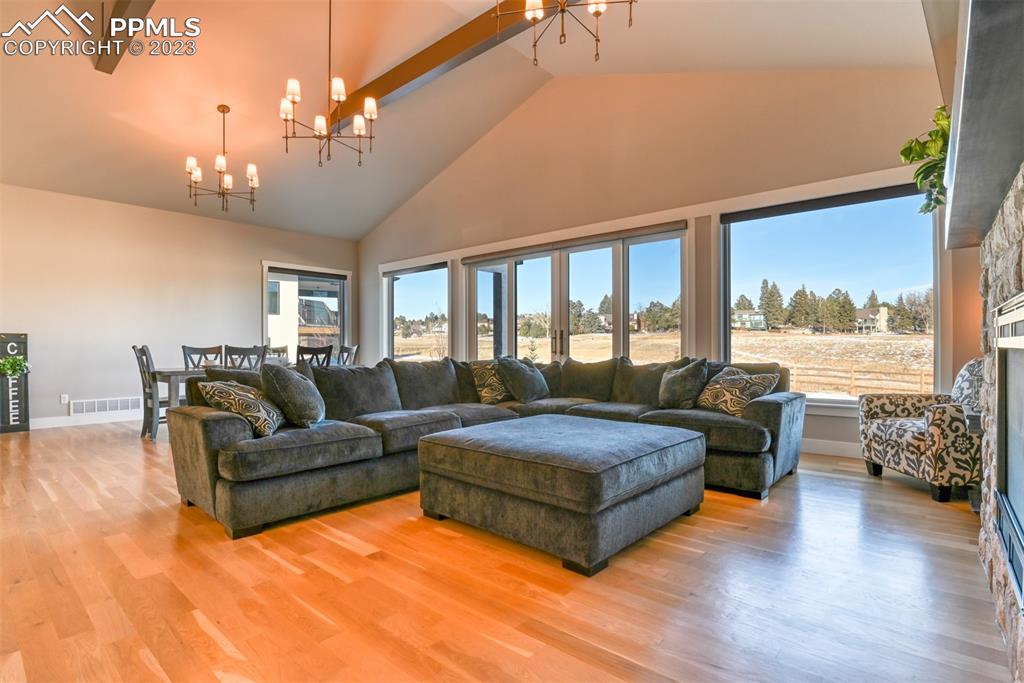 14149 Stone Eagle Place Colorado Springs, CO 80921 - Photo 27 of 47 a living room with furniture and a large window