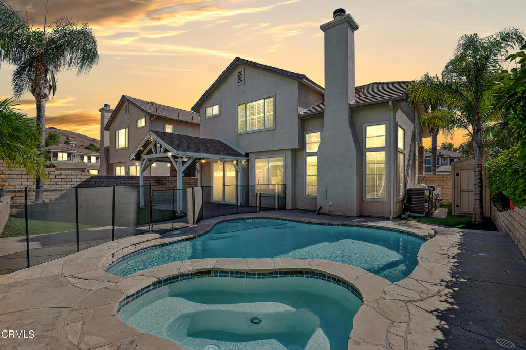 a view of a house with a swimming pool