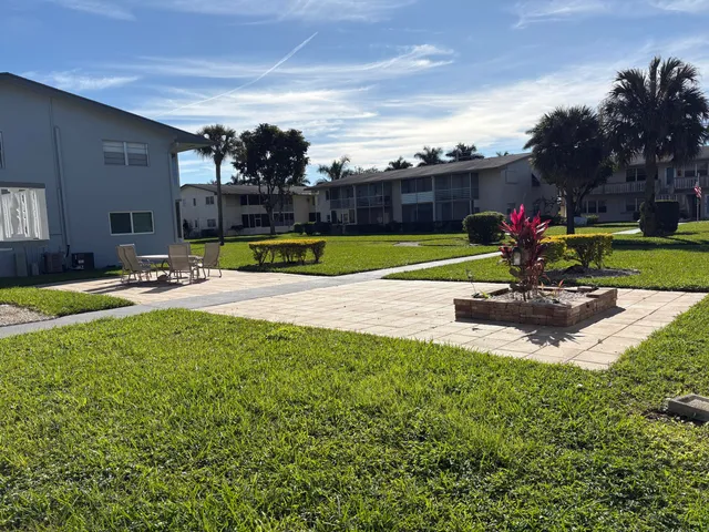 a view of a playground with a patio