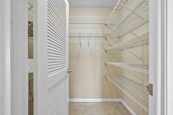 a view of a room with sliding glass door