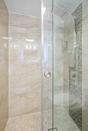 a view of a parking area and a car park in the back