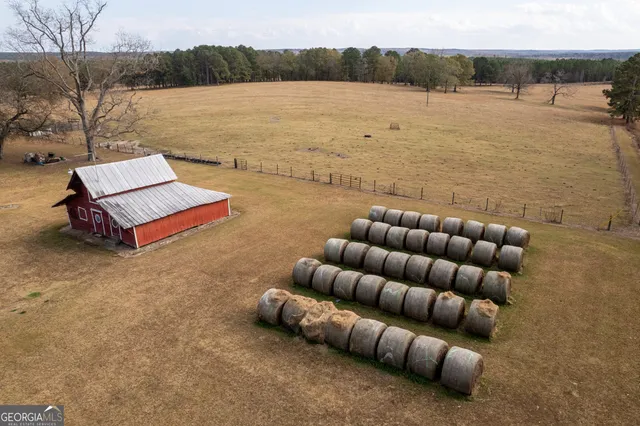 an aerial view of houses with yard