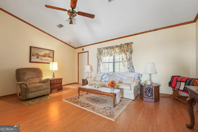 a kitchen that has a sink and a stove in it