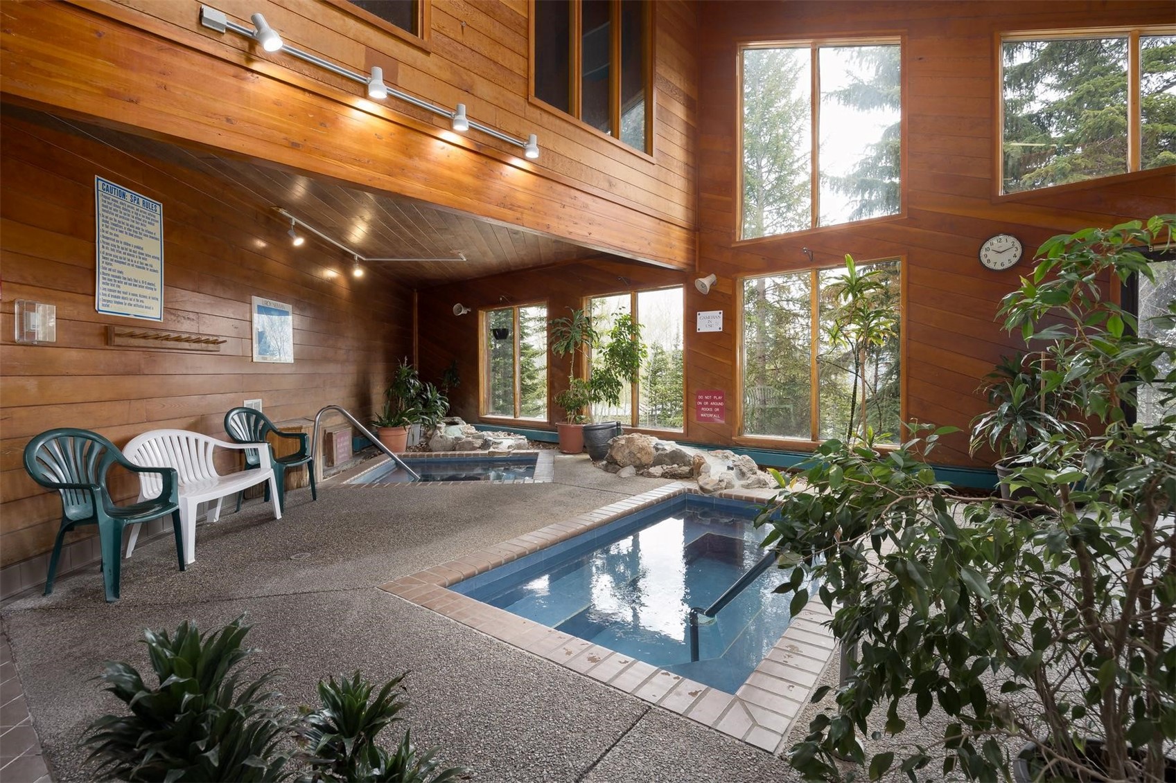 91100 Ryan Gulch Road, Unit 91105 Silverthorne, CO 80498 - Photo 49 of 49 a view of a patio with table and chairs and potted plants