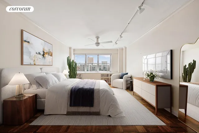 a bedroom with a large bed and a window