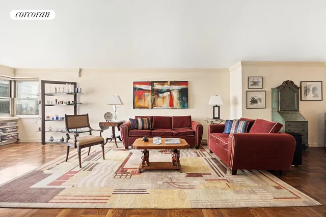 a living room with furniture and a rug
