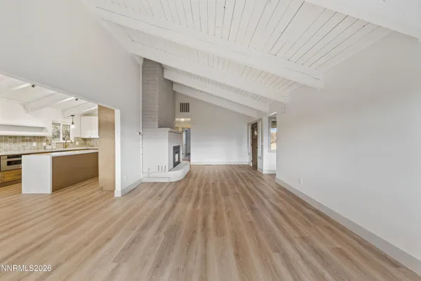 a view of kitchen and wooden floor