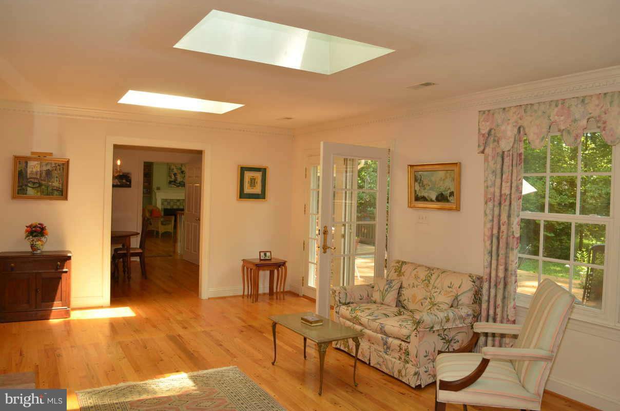 507 Epping Forest Road Annapolis, MD 21401 - Photo 12 of 30 Living room with French doors to deck
