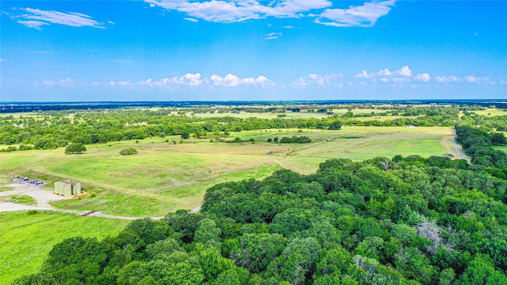 2215 Denver Road Sunset, TX 76270 - Photo 11 of 36 a view of an ocean and a yard