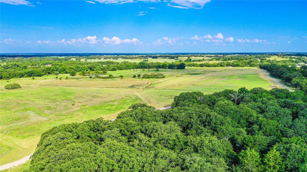 2215 Denver Road Sunset, TX 76270 - Photo 29 of 36 a view of an ocean and a yard