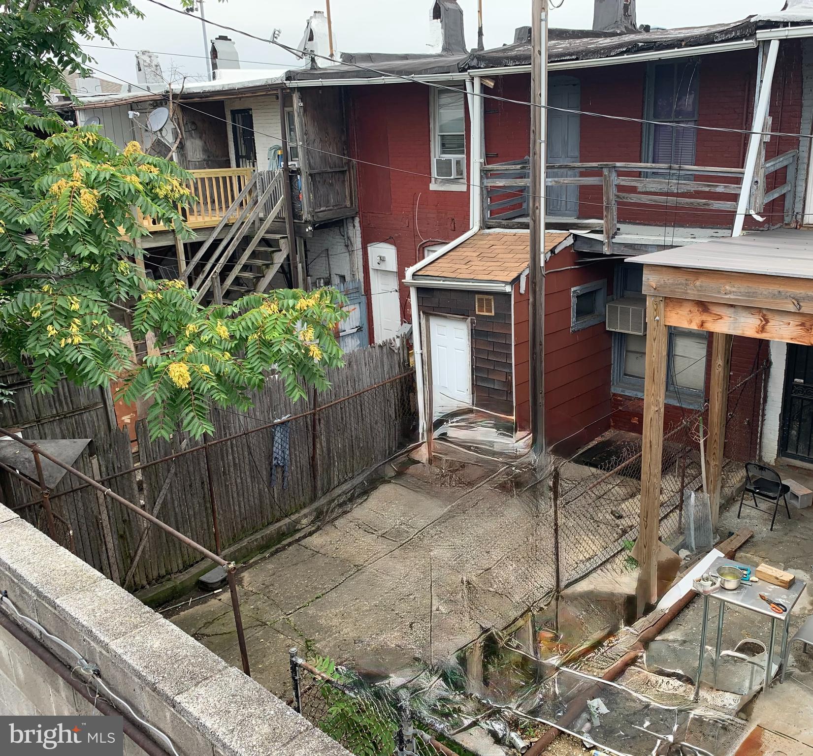 4919 Eastern Avenue Baltimore, MD 21224 - Photo 17 of 17 a front view of a house with balcony