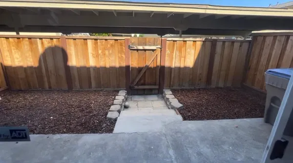 a kitchen with a sink cabinets and window