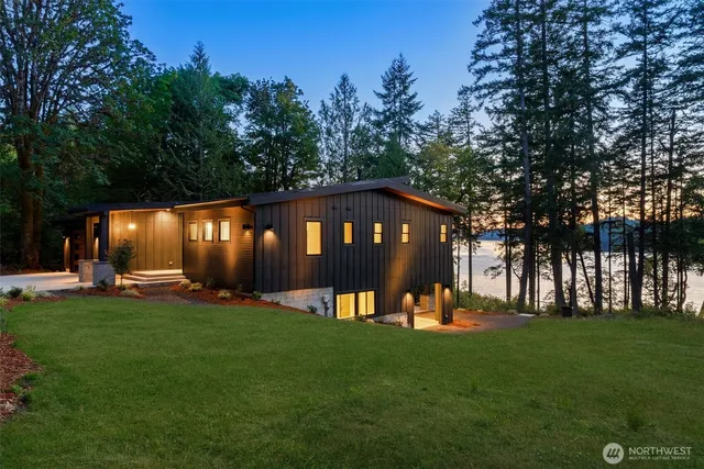 a view of a park with large trees