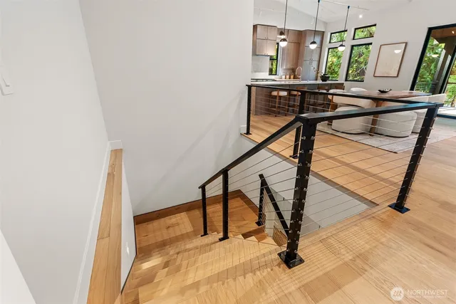 a view of a hallway with seating area