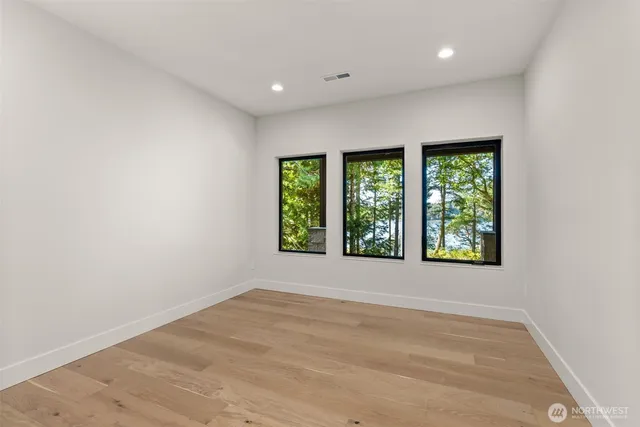 an empty room with windows