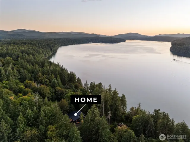 a view of a street with a building in the background