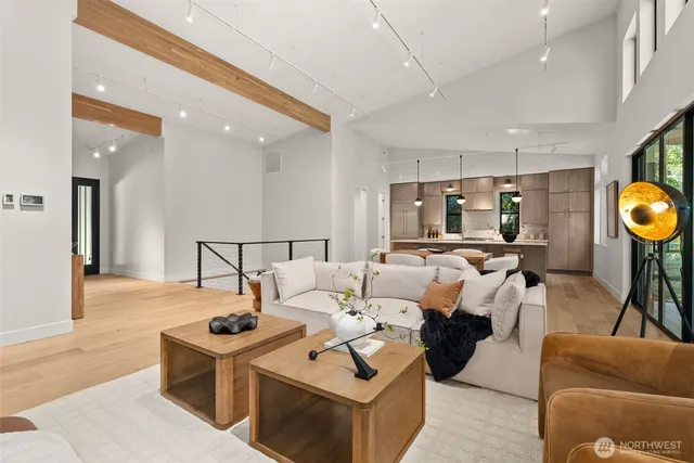 a living room with furniture and a table