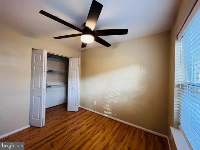 a view of a house with a bench and chair