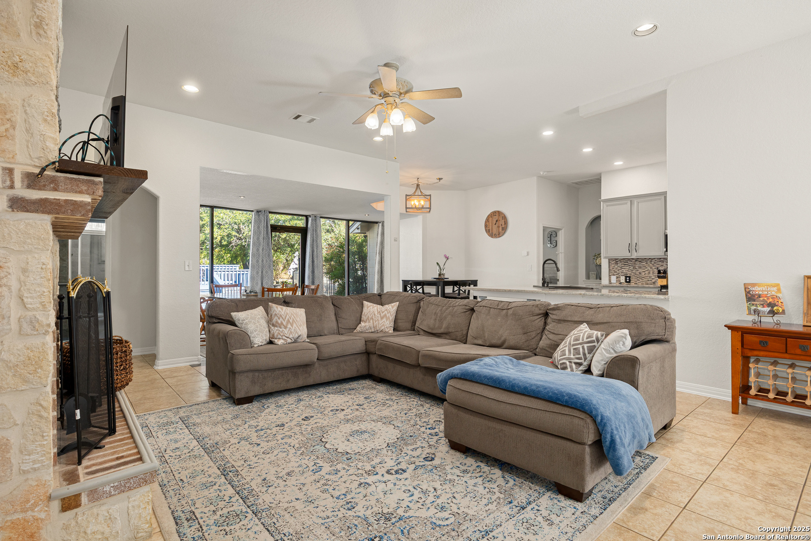 166 Bridle Path Spring Branch, TX 78070 - Photo 12 of 48 a living room with furniture and a large window