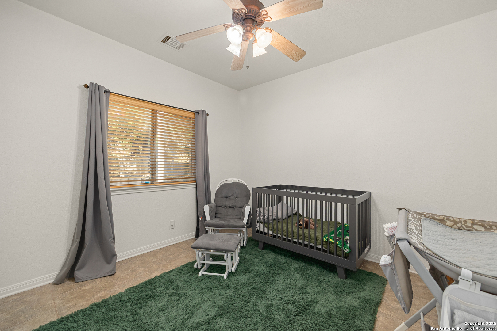 166 Bridle Path Spring Branch, TX 78070 - Photo 16 of 48 a living room with furniture and a window