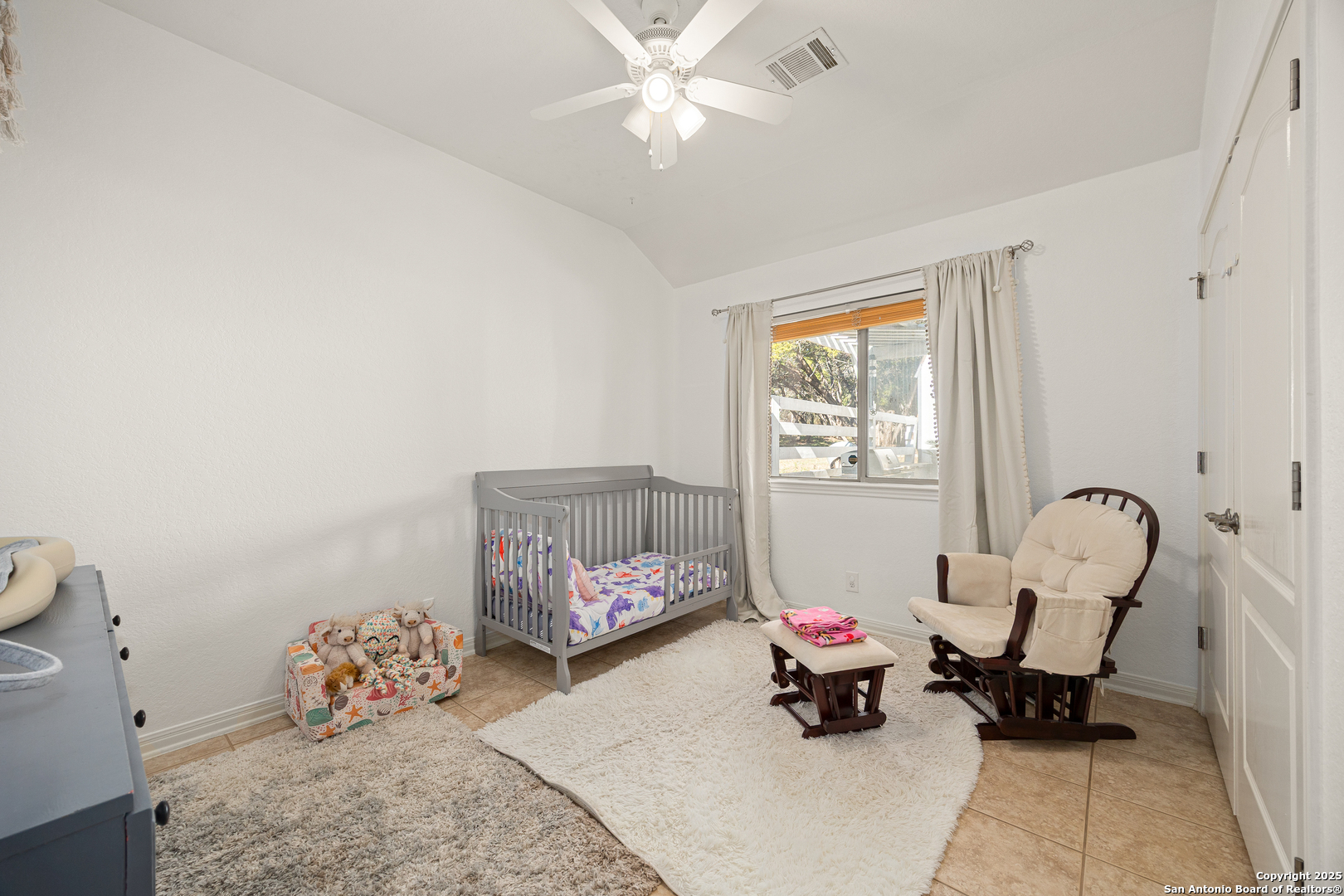 166 Bridle Path Spring Branch, TX 78070 - Photo 19 of 48 a bedroom with a bed and furniture