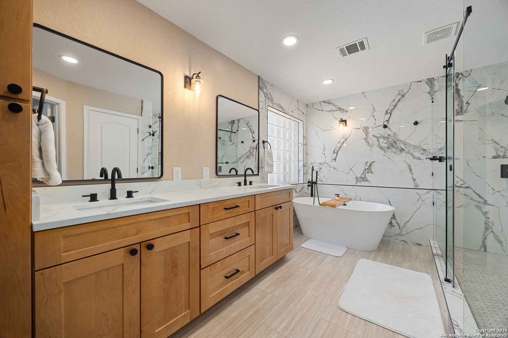 166 Bridle Path Spring Branch, TX 78070 - Photo 22 of 48 a bathroom with a double vanity sink mirror and toilet
