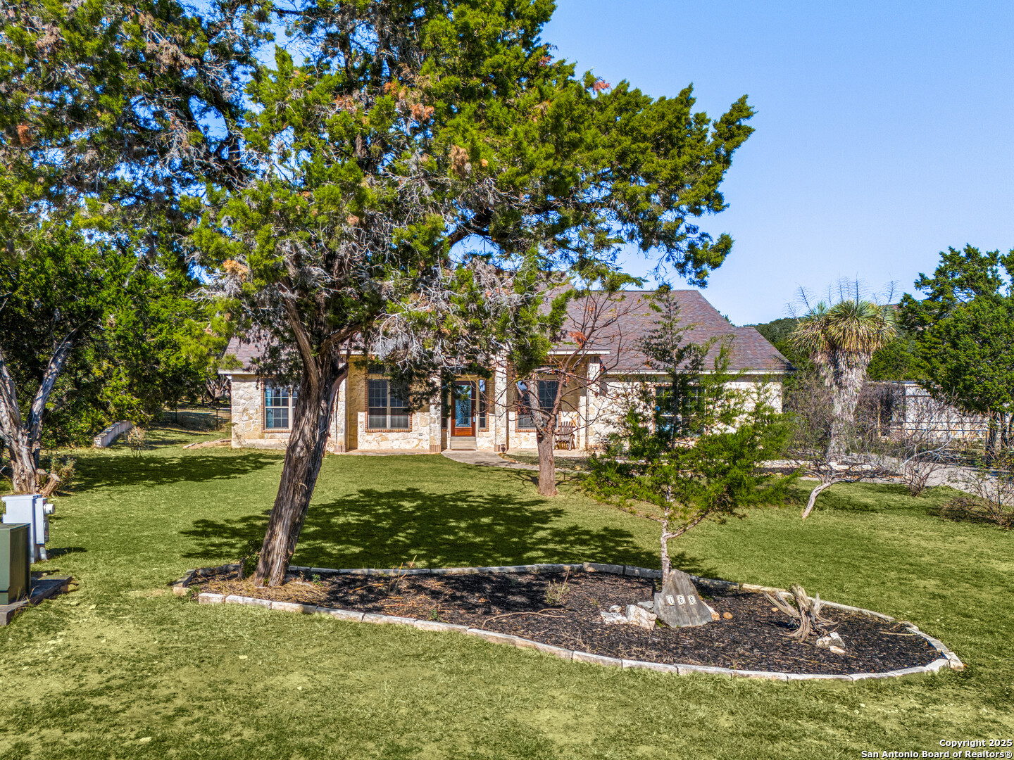 166 Bridle Path Spring Branch, TX 78070 - Photo 4 of 48 a view of a garden