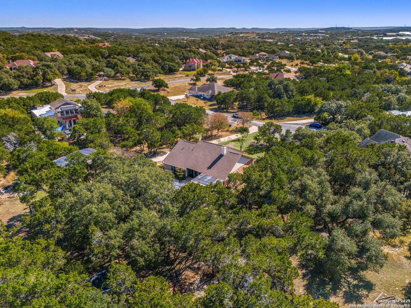 166 Bridle Path Spring Branch, TX 78070 - Photo 44 of 48 an aerial view of residential houses with outdoor space and trees