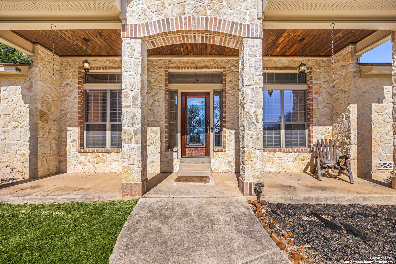166 Bridle Path Spring Branch, TX 78070 - Photo 5 of 48 a front view of a house with a porch