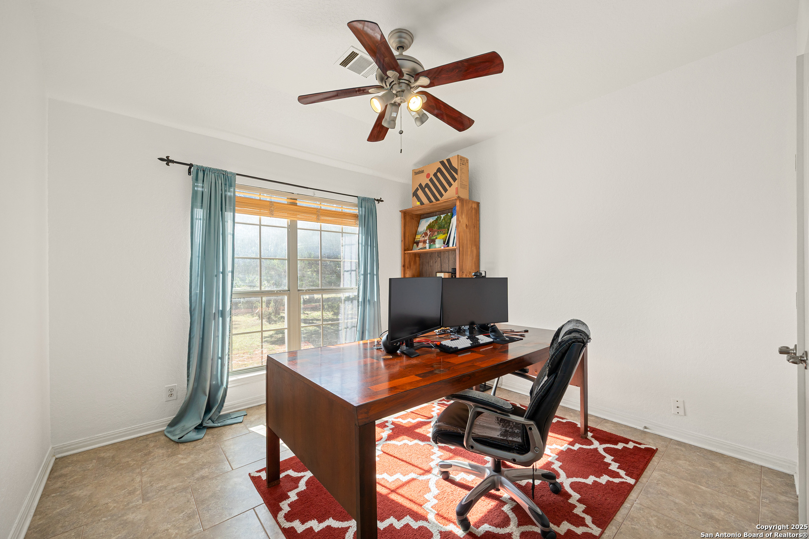 166 Bridle Path Spring Branch, TX 78070 - Photo 9 of 48 a workspace with furniture and a window