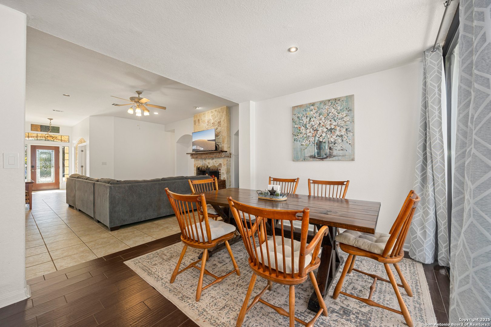166 Bridle Path Spring Branch, TX 78070 - Photo 10 of 48 a view of a dining room with furniture and wooden floor