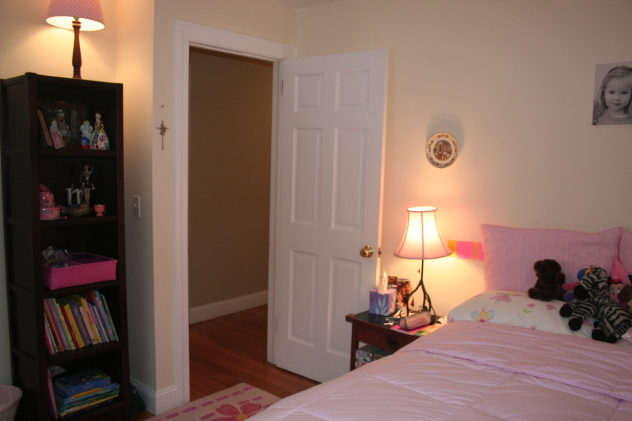 71 Silver Ridge Road New Canaan, CT 06840 - Photo 16 of 29 a bedroom with a bed and a walk in closet