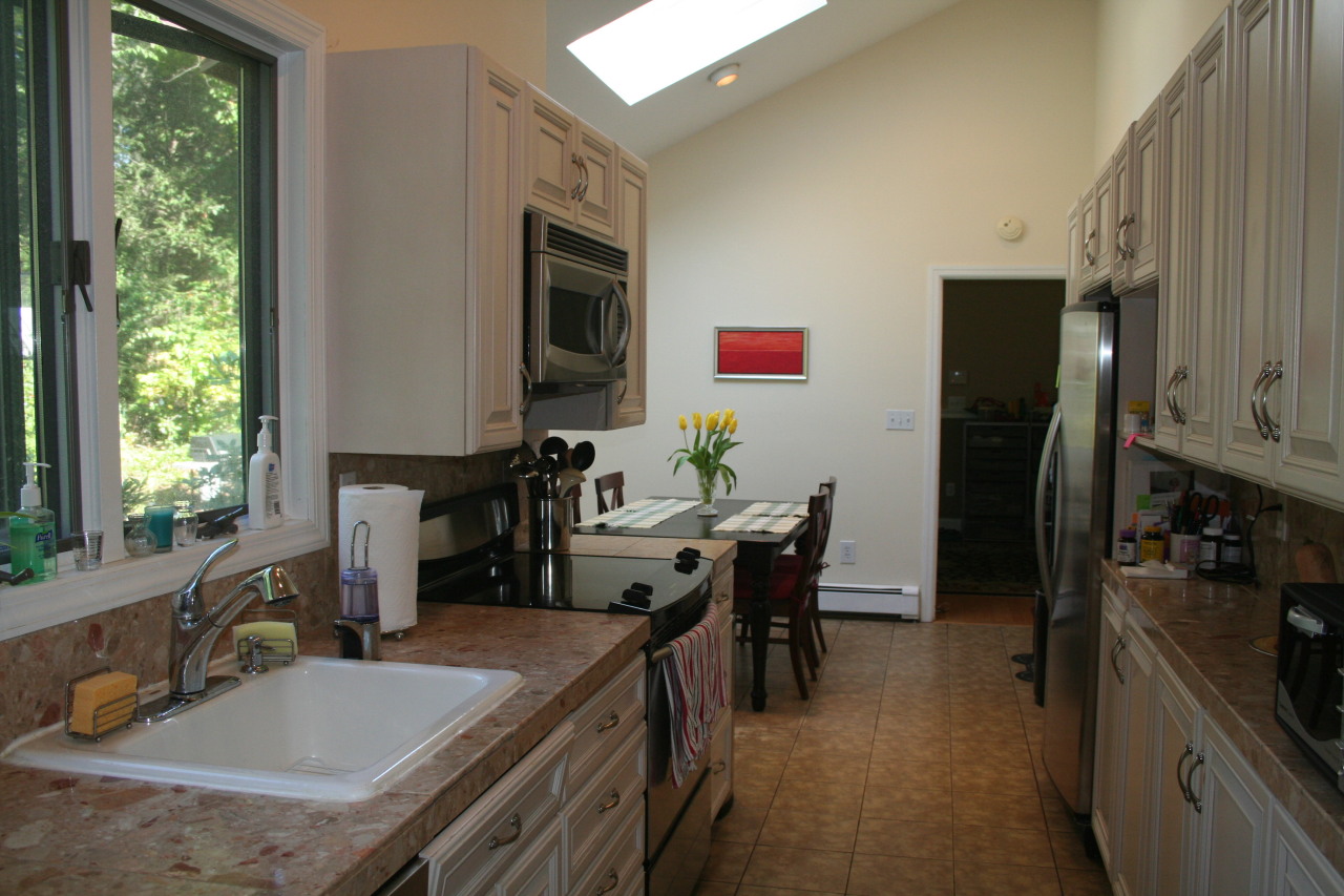 71 Silver Ridge Road New Canaan, CT 06840 - Photo 7 of 29 a very nice looking dining room with a large window