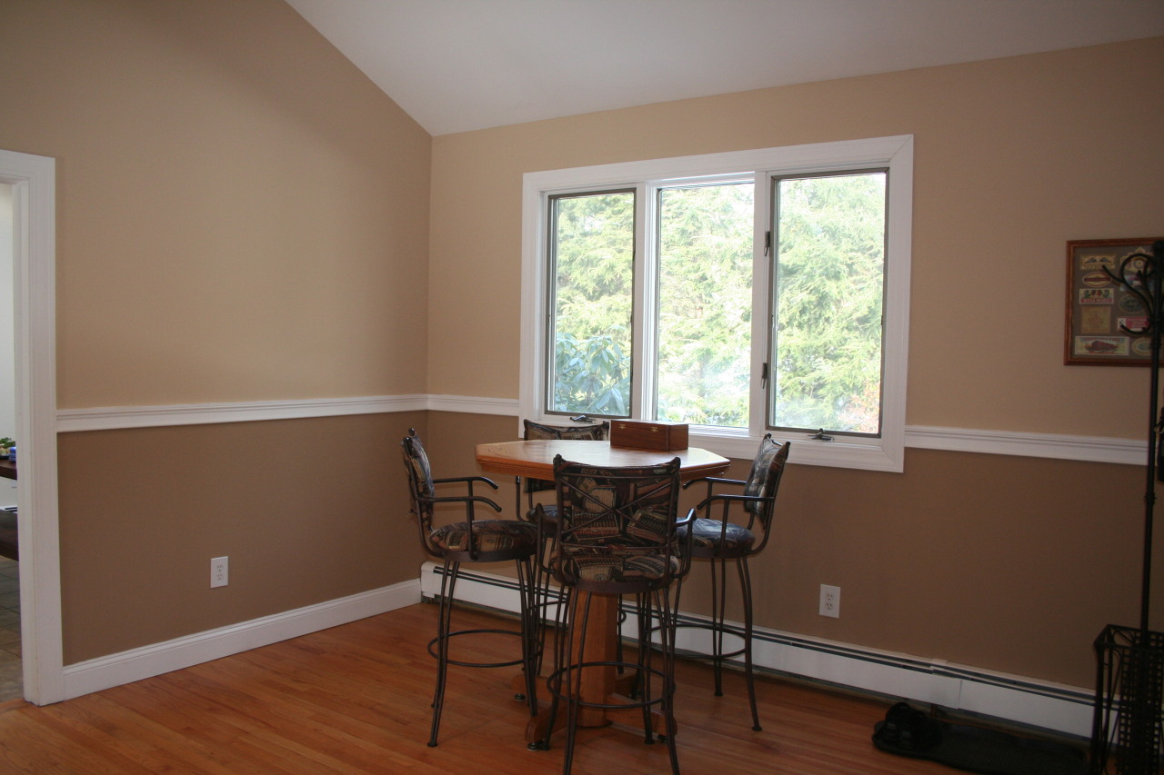 71 Silver Ridge Road New Canaan, CT 06840 - Photo 9 of 29 a view of a workspace with furniture and a window