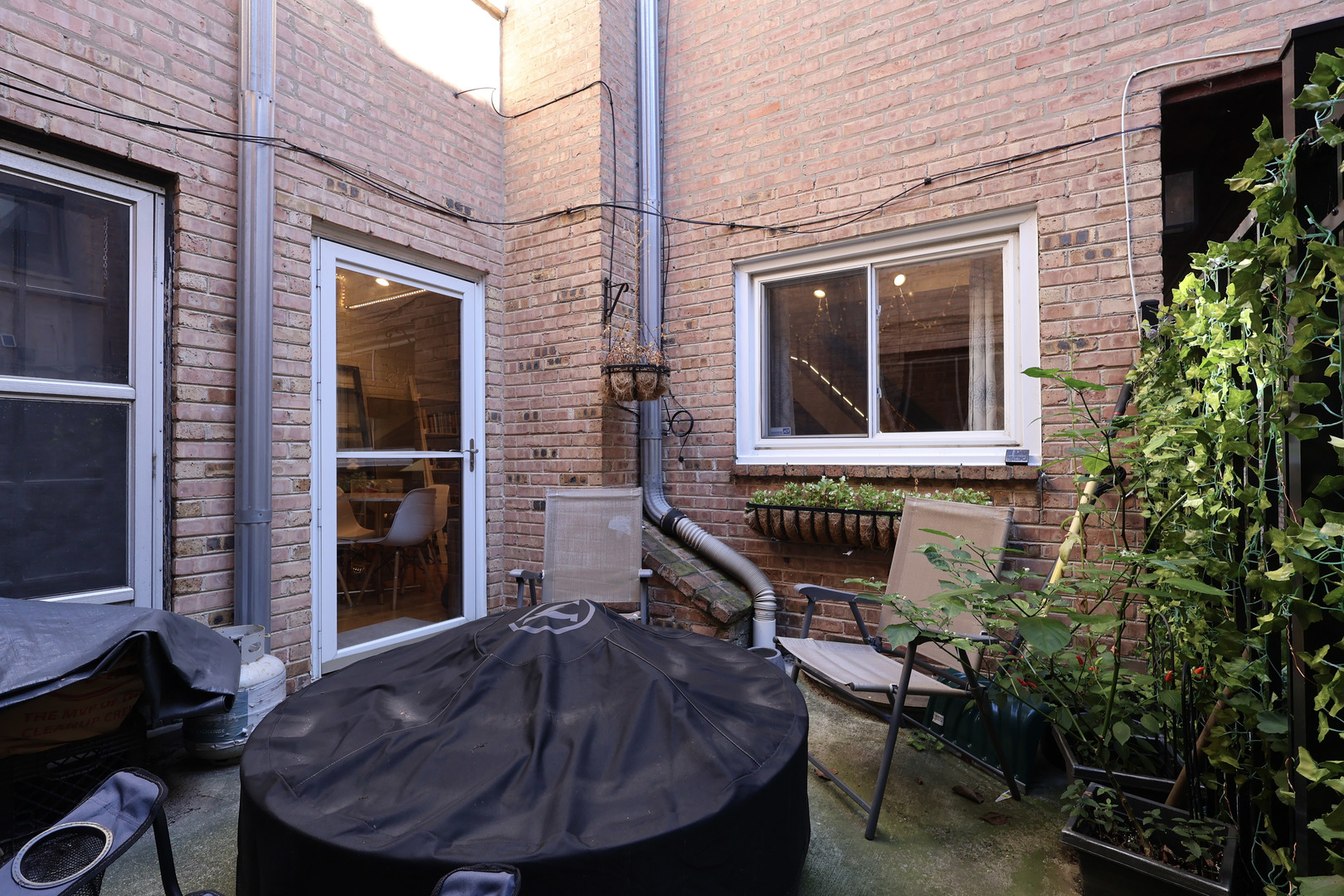 1630 North Sedgwick Street, Unit 2 Chicago, IL 60614 - Photo 12 of 28 a view of house with chair and outdoor seating