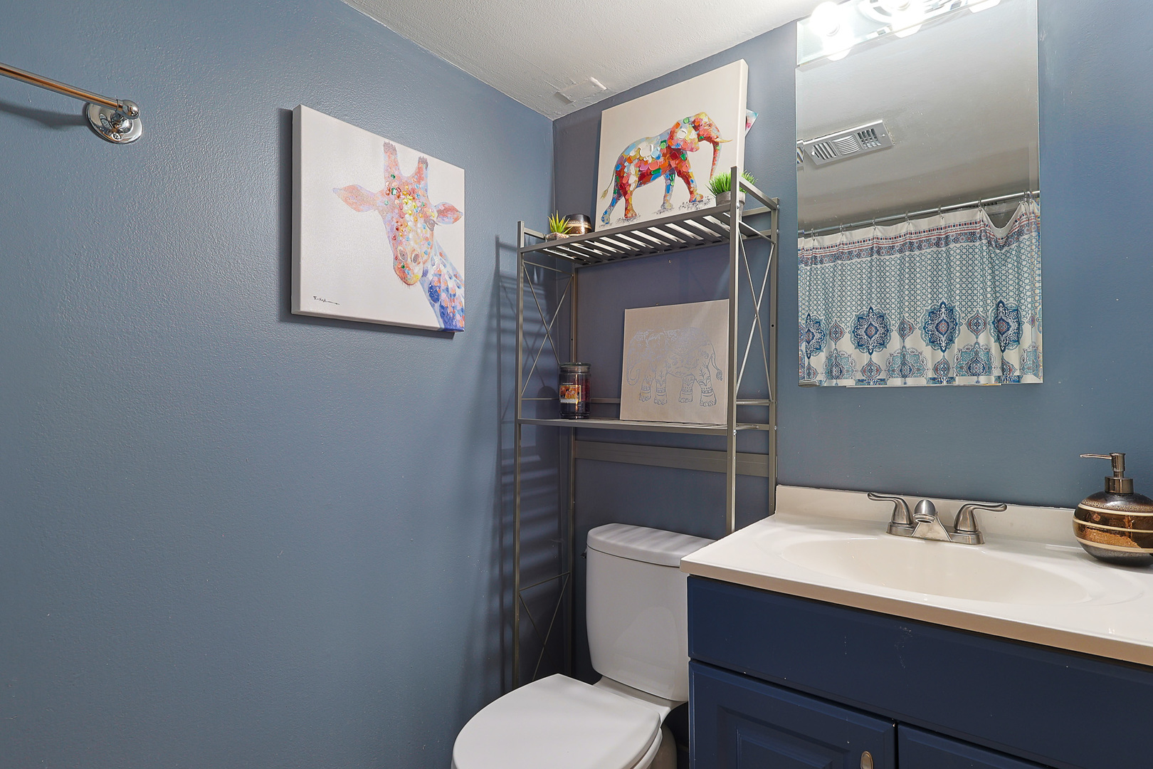 1630 North Sedgwick Street, Unit 2 Chicago, IL 60614 - Photo 26 of 28 a bathroom with a toilet a sink and mirror